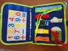 Montessori busy board fejlesztő táska 1-7 éves korig
