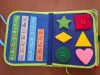 Montessori busy board fejlesztő táska 1-7 éves korig