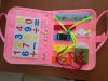 Montessori busy board fejlesztő táska 1-7 éves korig